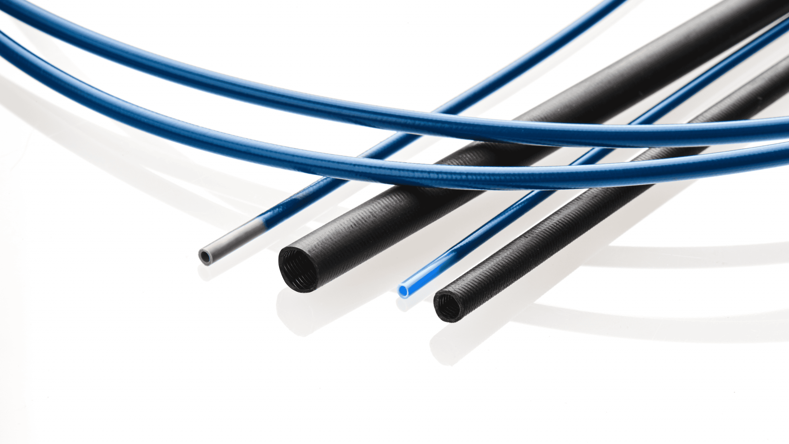 Medical extrusion tubing in blue and black thermoplastic materials